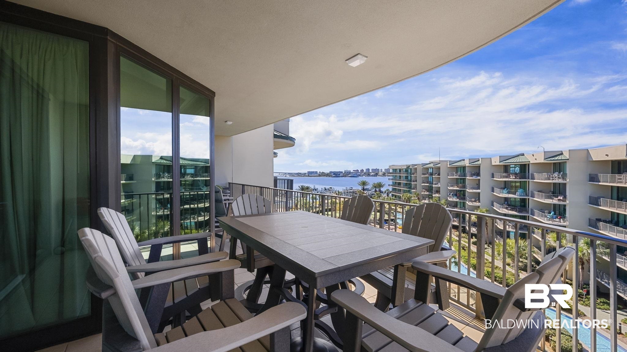 27580 Canal Road, Unit 1526 Orange Beach, AL 36561 - Photo 26 of 49 Balcony with outdoor dining area and a water view
