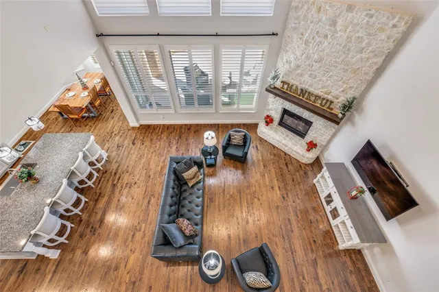 wooden floor with a rug and a wooden floor