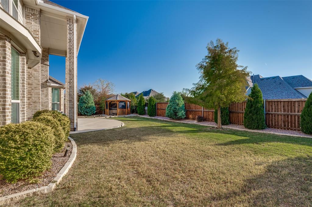 2631 Seabiscuit Road Celina, TX 75009 - Photo 35 of 40 a view of a house with a yard