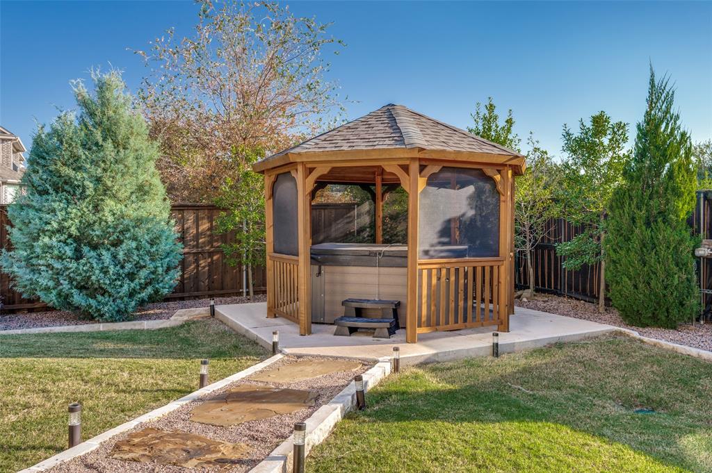 2631 Seabiscuit Road Celina, TX 75009 - Photo 36 of 40 a front view of a house with garden