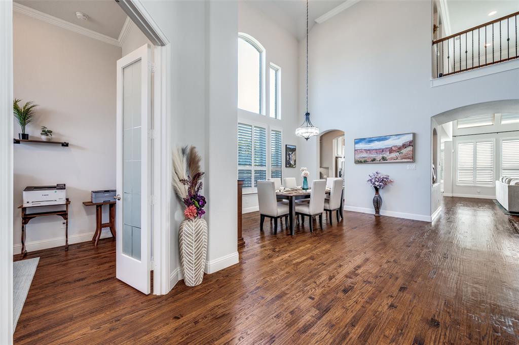2631 Seabiscuit Road Celina, TX 75009 - Photo 7 of 40 a living room with furniture and wooden floor