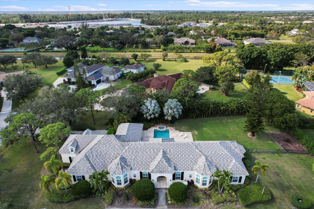 5775 Lady Luck Road Palm Beach Gardens, FL 33418 - Photo 41 of 45 an aerial view of residential houses with outdoor space and river