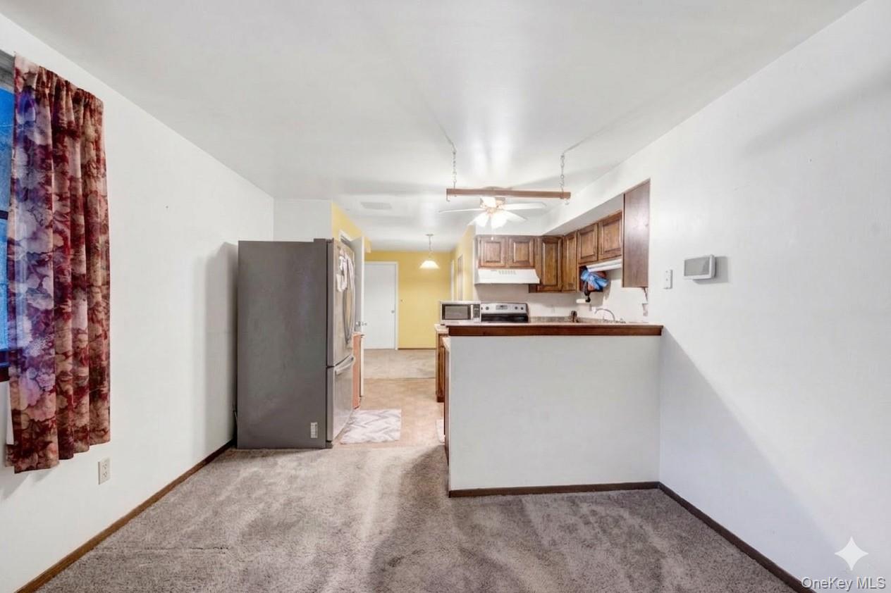 17 Last Road Middletown, NY 10941 - Photo 14 of 22 a view of kitchen with refrigerator and window