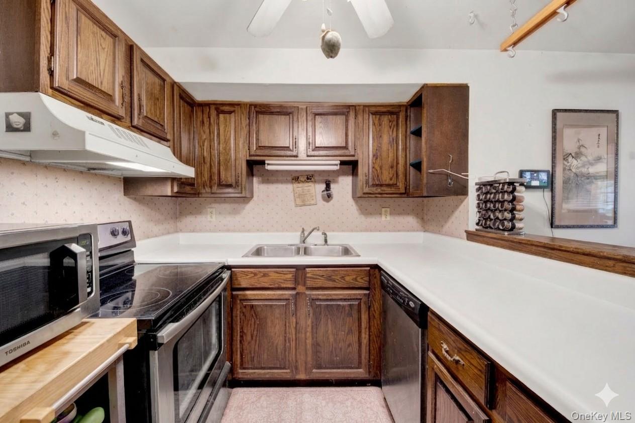 17 Last Road Middletown, NY 10941 - Photo 19 of 22 a kitchen with a sink stove and cabinets