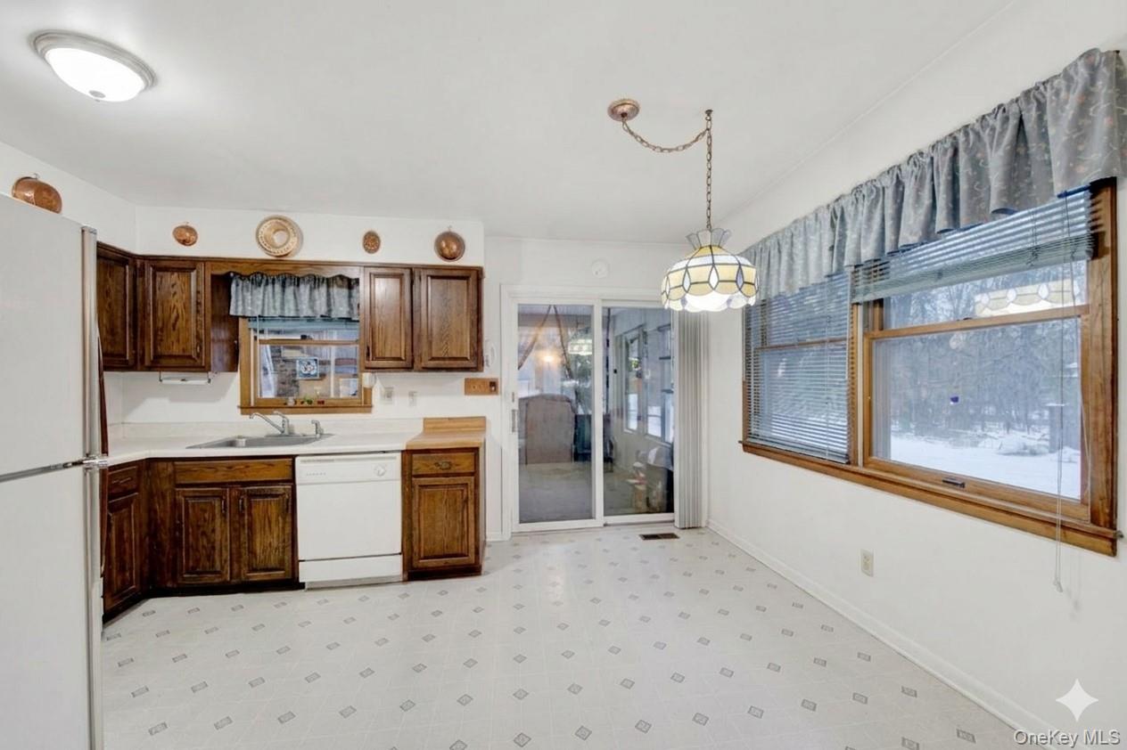 17 Last Road Middletown, NY 10941 - Photo 8 of 22 a open kitchen with stainless steel appliances granite countertop a stove and cabinets