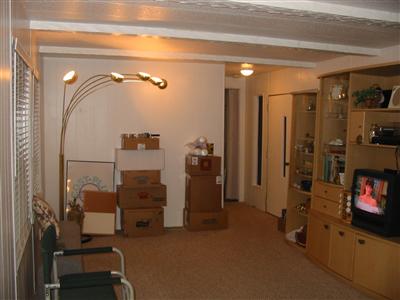 Living room area. window coverings stay with the home