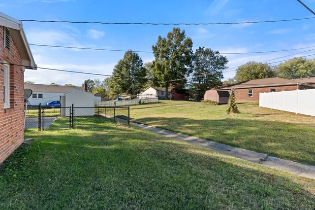 a view of a park with of a house
