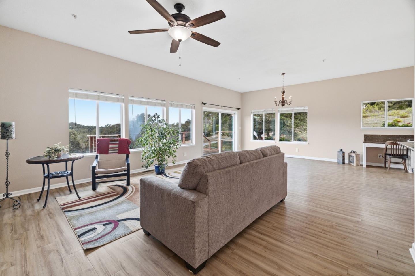 19269 Mallory Canyon Road, Unit D Salinas, CA 93907 - Photo 6 of 77 a living room with furniture and a large window