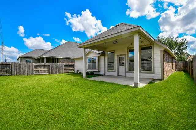 a view of a house with a garden