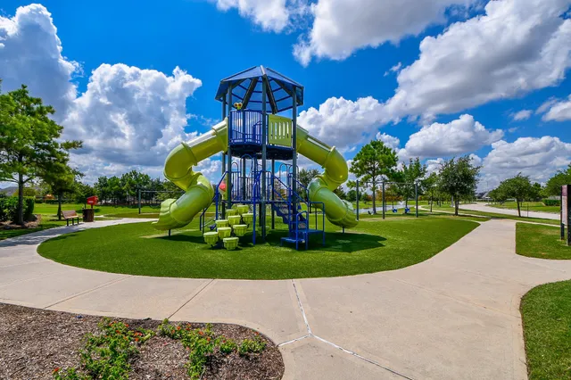 a view of a park with a yard