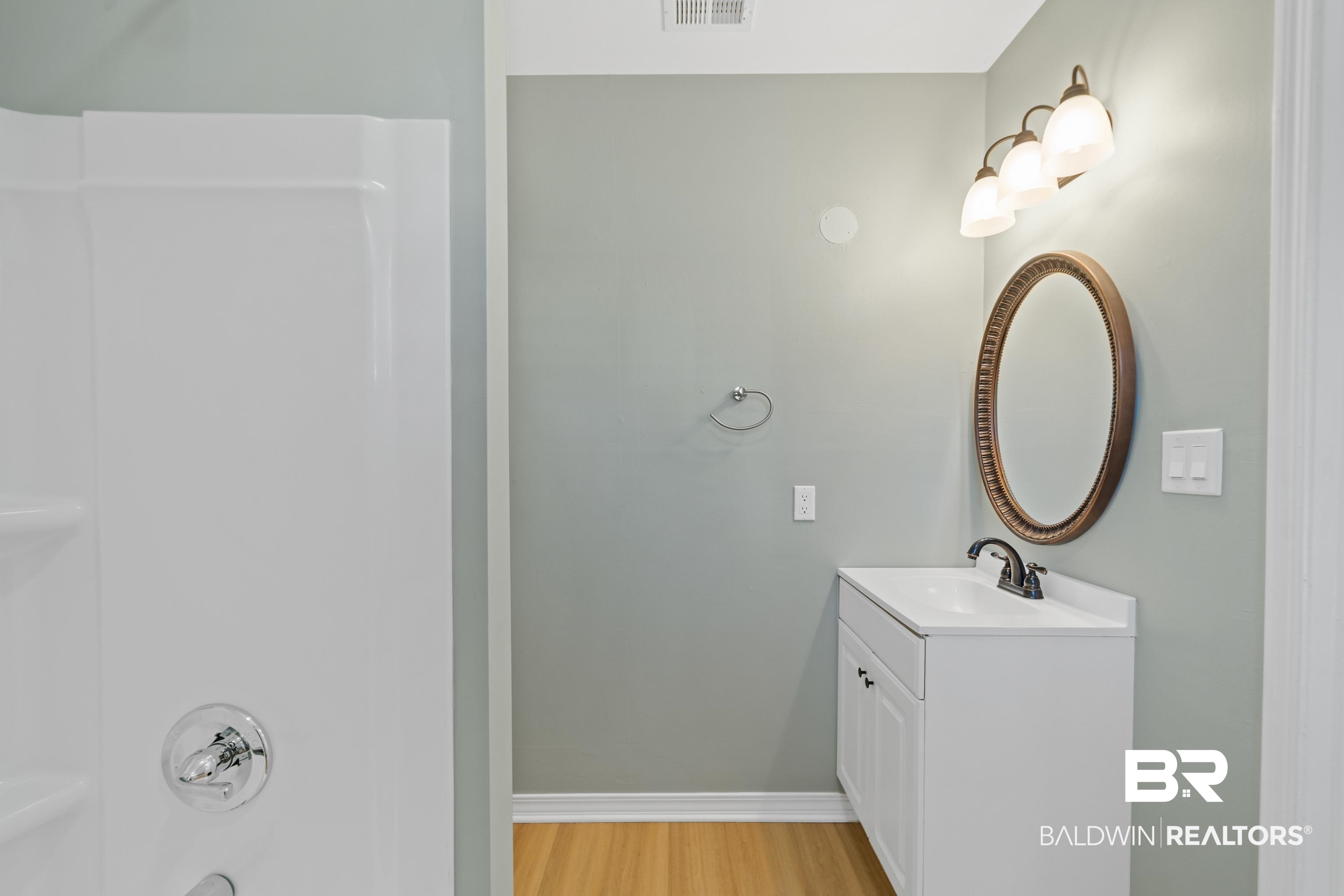 306 Liberty Street Fairhope, AL 36532 - Photo 20 of 32 Additional storage, new vanity & light fixture.