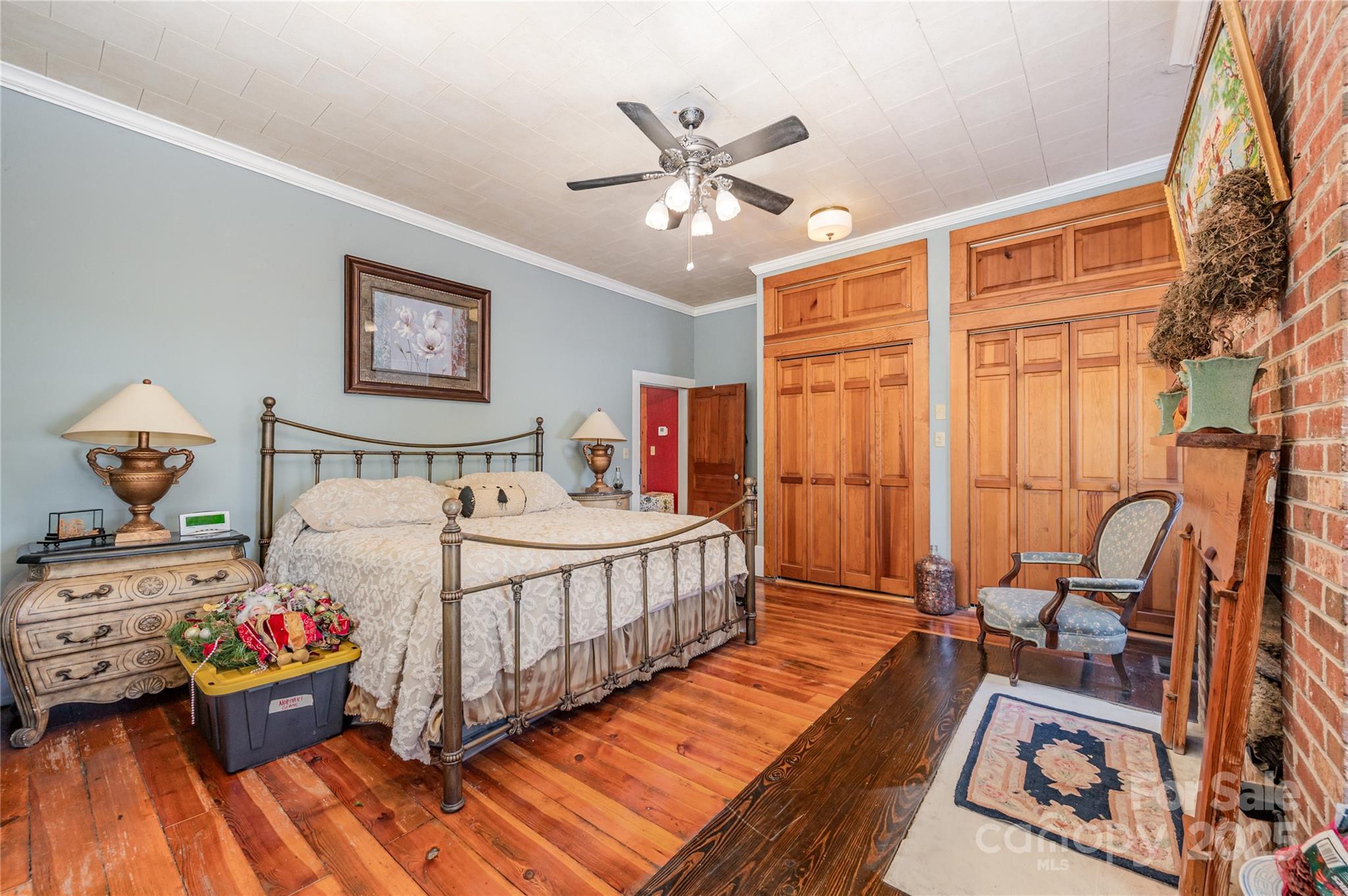 4833 Casar Road Lawndale, NC 28090 - Photo 18 of 48 a bedroom with furniture and a chandelier