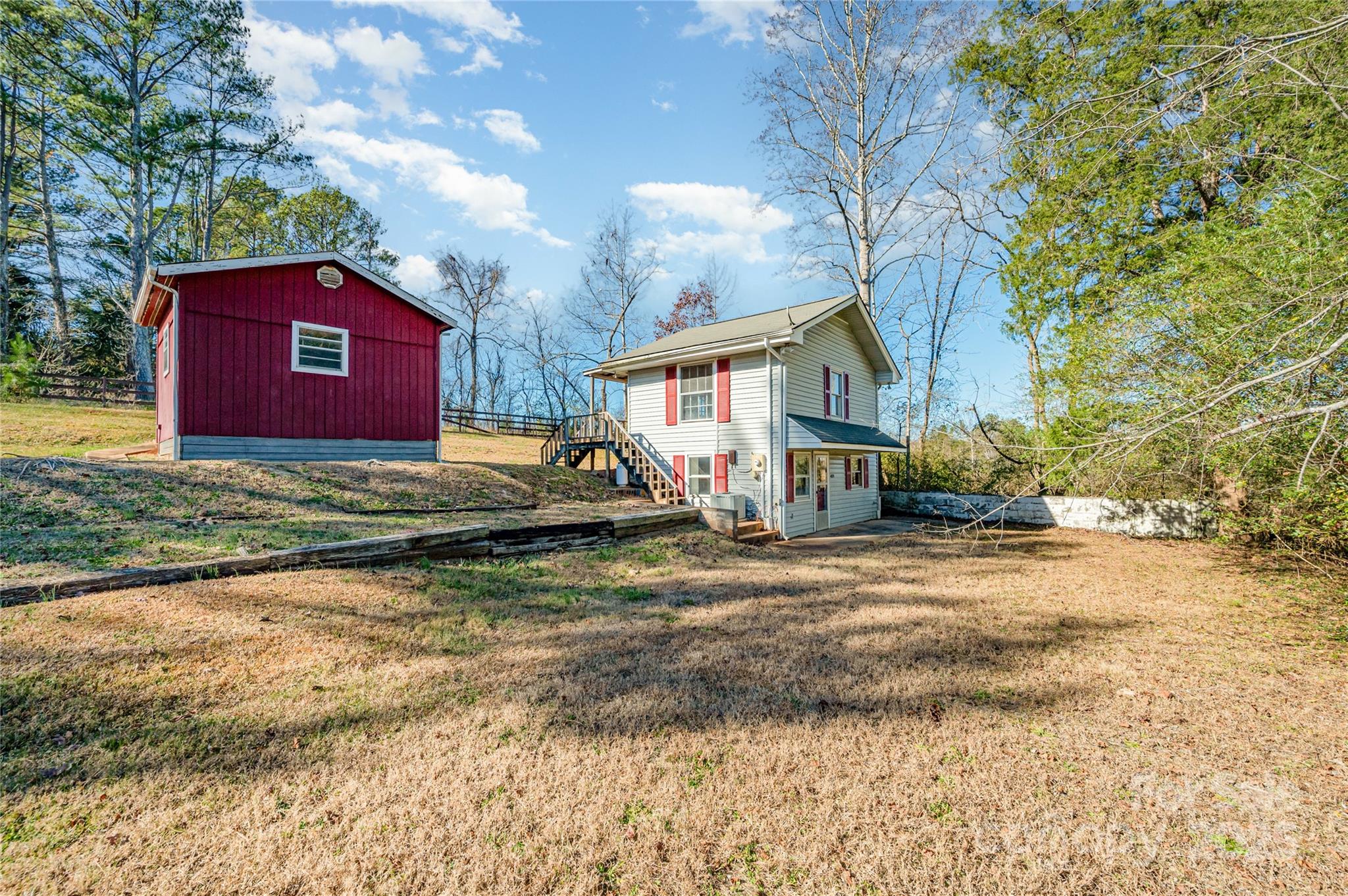 4833 Casar Road Lawndale, NC 28090 - Photo 32 of 48 a view of a house with a yard