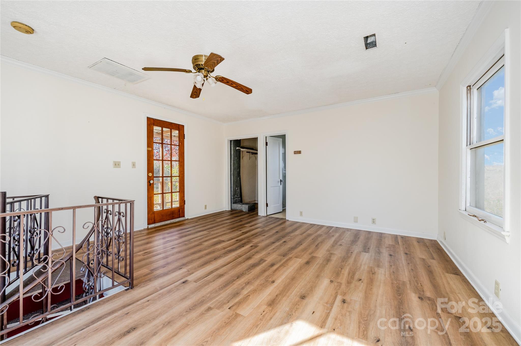 4833 Casar Road Lawndale, NC 28090 - Photo 34 of 48 a view of empty room with wooden floor and fan