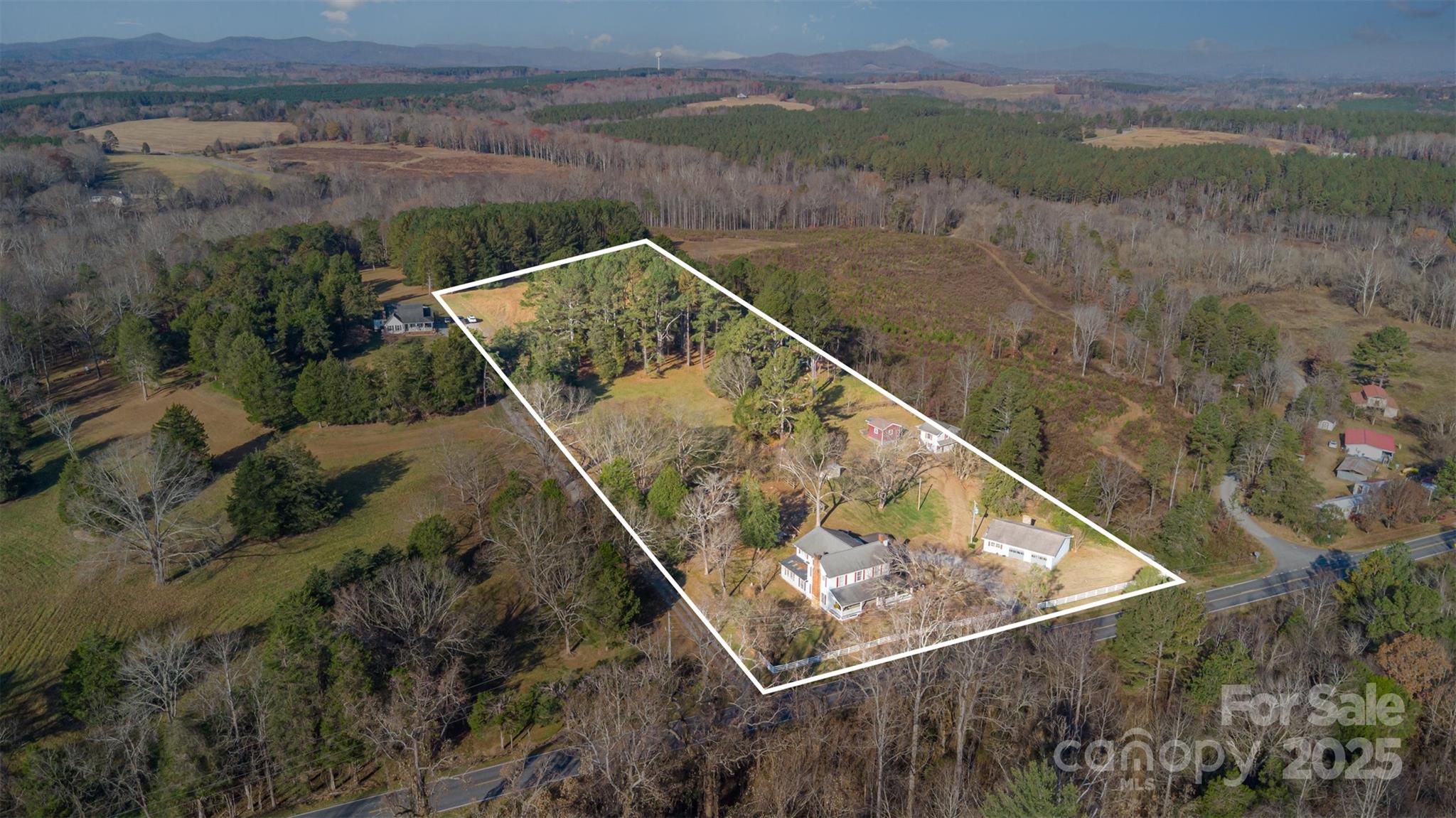 4833 Casar Road Lawndale, NC 28090 - Photo 46 of 48 a view of a lake with a mountain