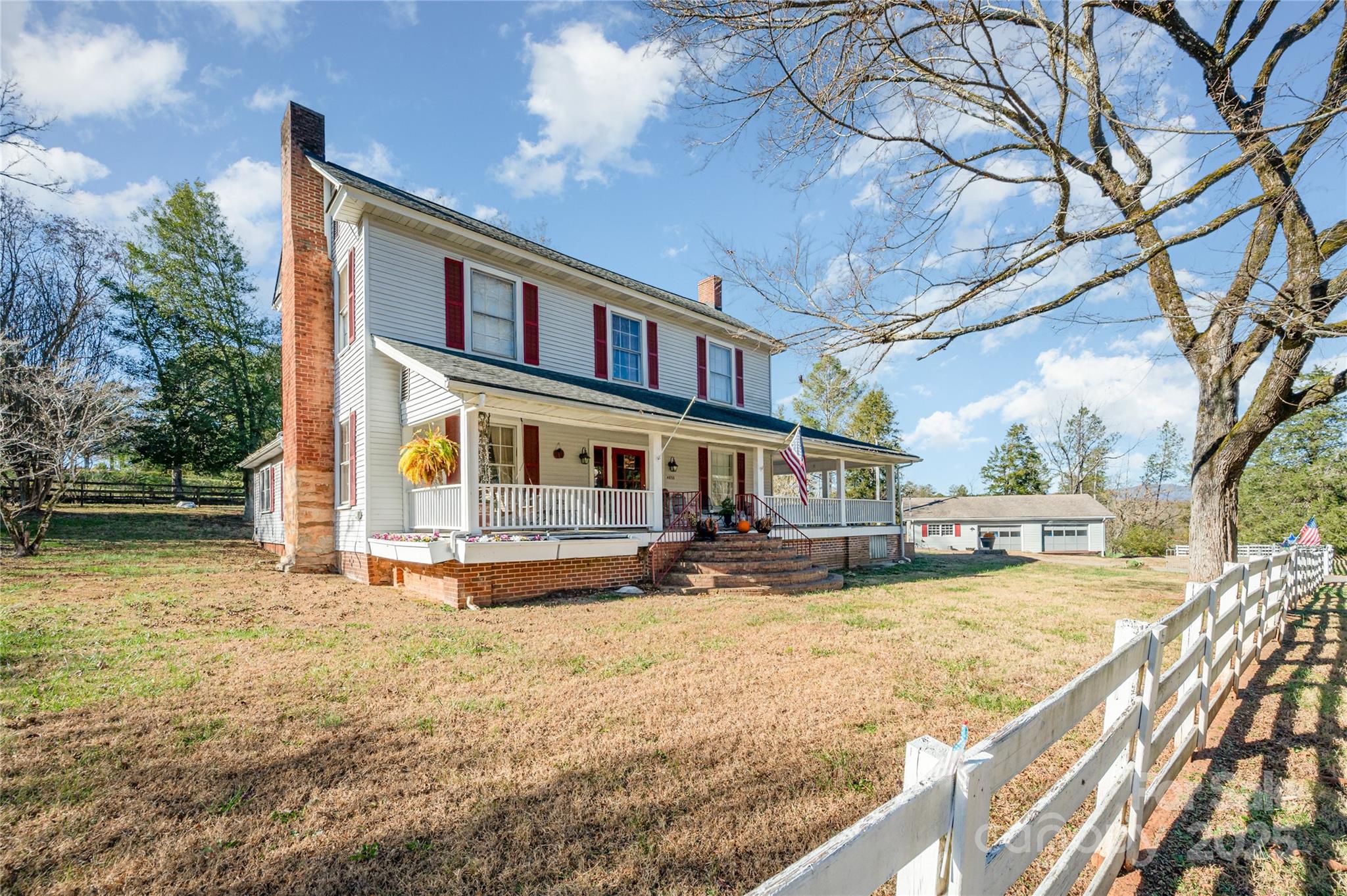 4833 Casar Road Lawndale, NC 28090 - Photo 5 of 48 a view of a house with a yard patio and fire pit
