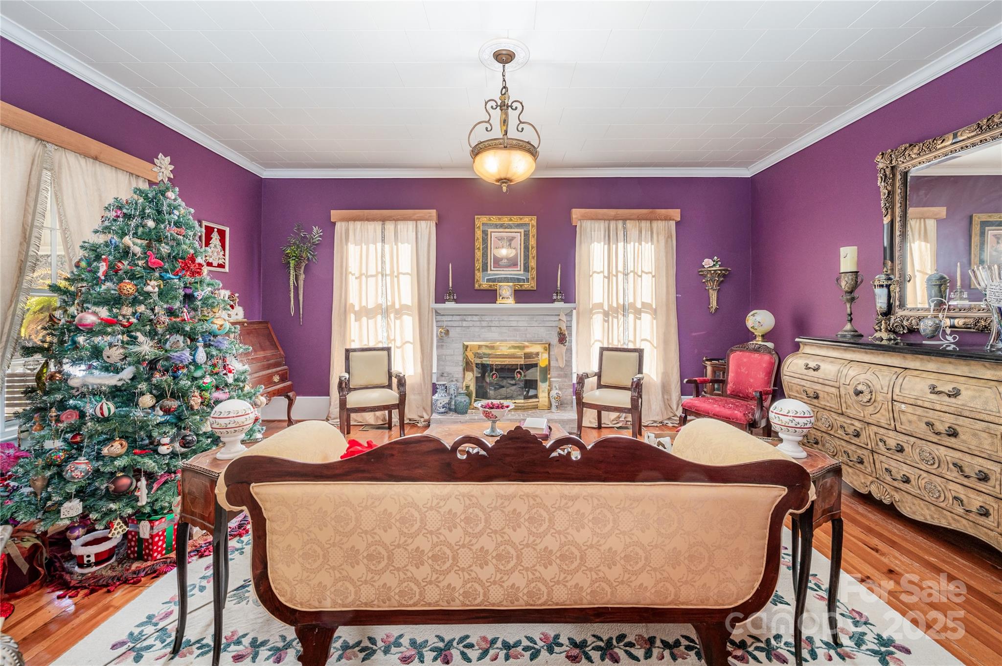 4833 Casar Road Lawndale, NC 28090 - Photo 7 of 48 a living room with furniture a chandelier and a fireplace