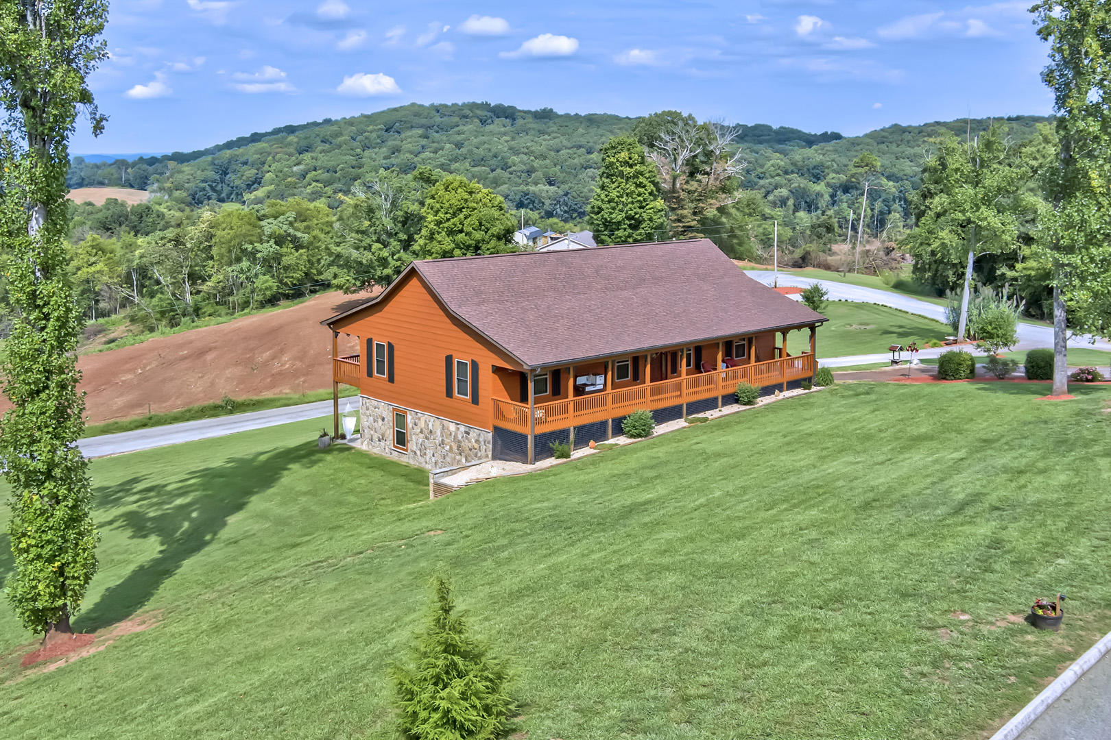 103 Eagle Ridge Court Philadelphia, TN 37846 - Photo 2 of 40 02_EagleRidgeCourt_103_FrontLeft