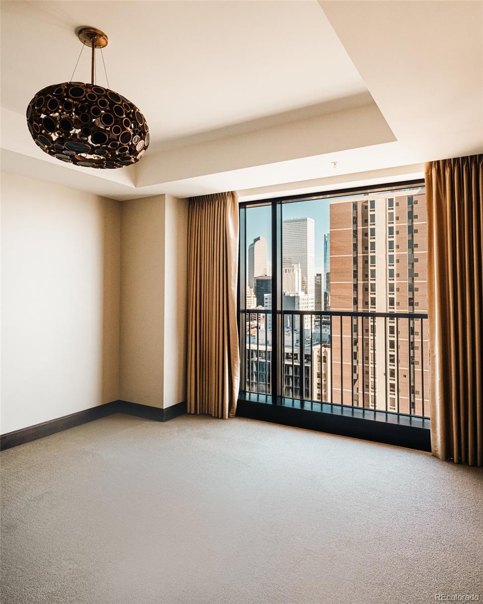 1133 14th Street, Unit 1940 Denver, CO 80202 - Photo 11 of 23 a view of an empty room with a window