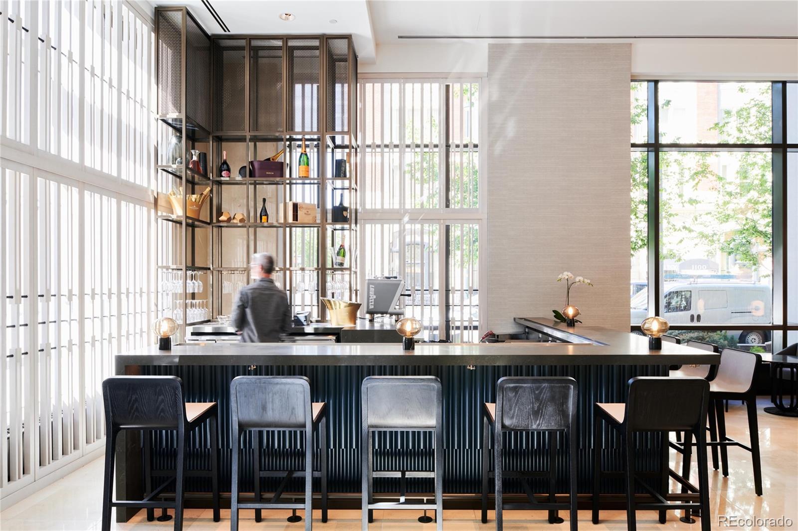 1133 14th Street, Unit 1940 Denver, CO 80202 - Photo 21 of 23 a dining table with chairs and window