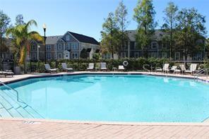 5681 Bidwell Parkway, Unit 204 Sarasota, FL 34233 - Photo 27 of 41 a house view with swimming pool and outdoor space