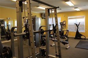 5681 Bidwell Parkway, Unit 204 Sarasota, FL 34233 - Photo 36 of 41 a view of a room with gym equipment