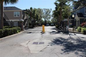 5681 Bidwell Parkway, Unit 204 Sarasota, FL 34233 - Photo 40 of 41 a view of a street with palm trees