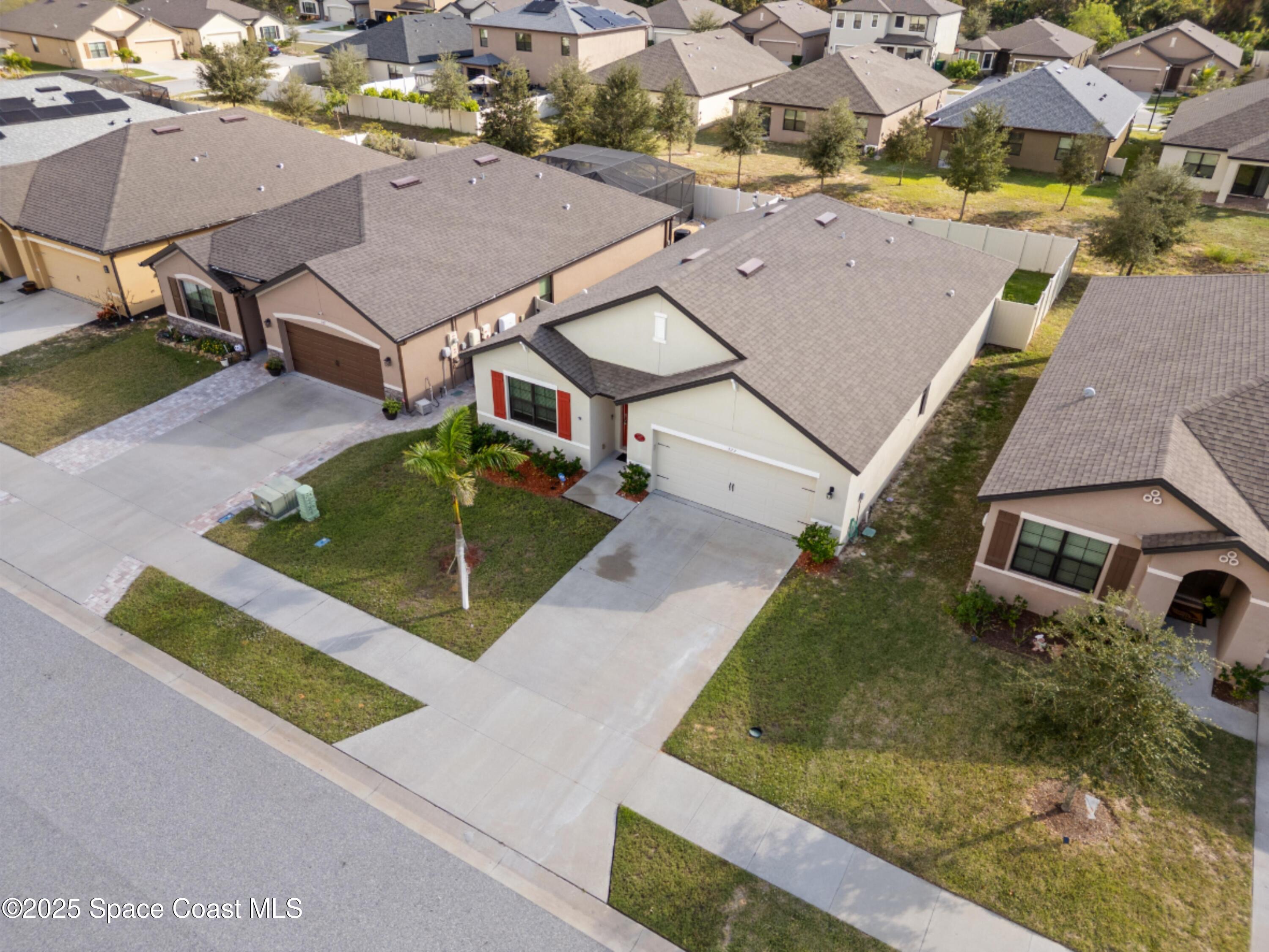 377 Snook Place Cocoa, FL 32927 - Photo 2 of 32 an aerial view of a house