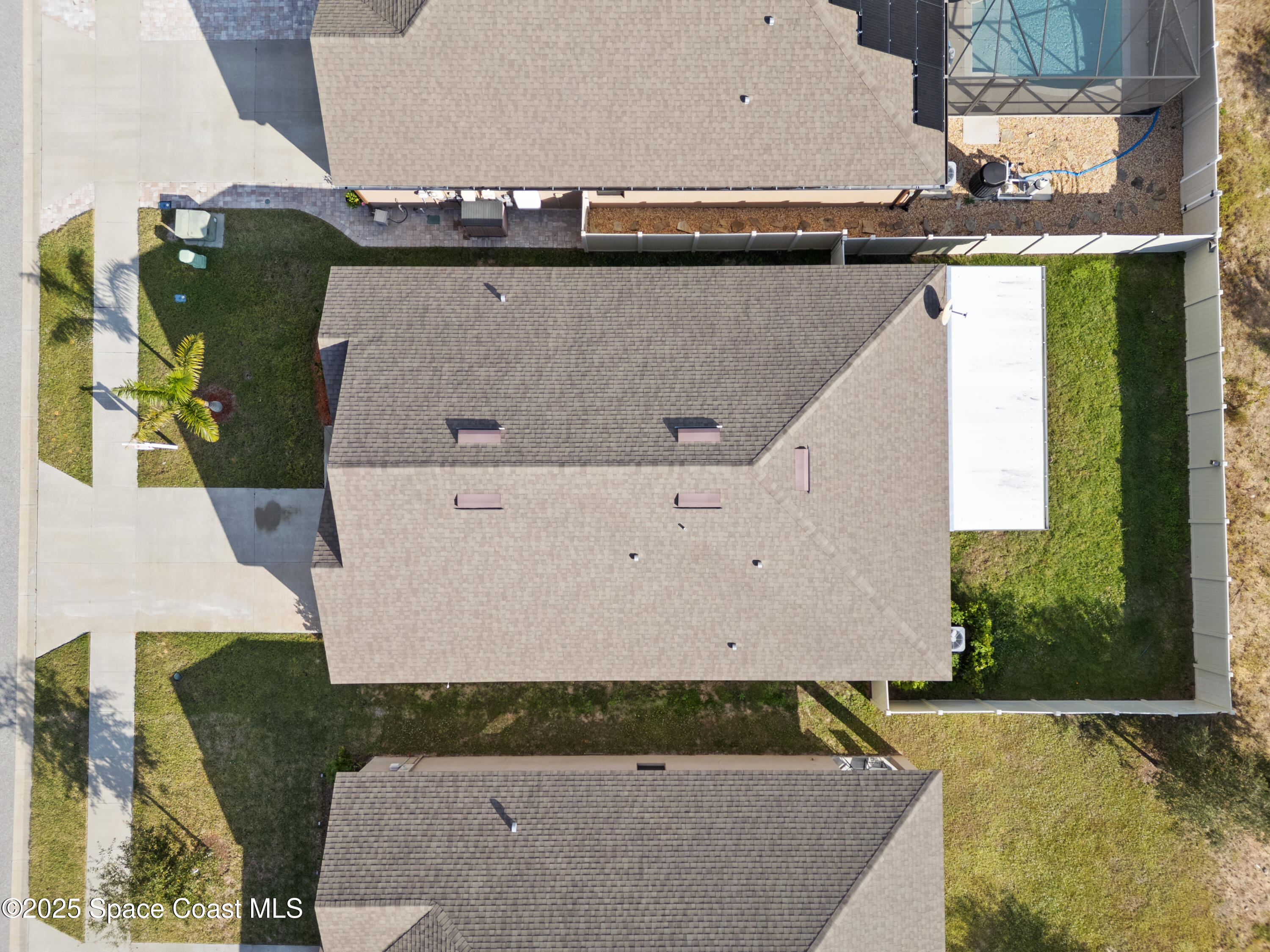 377 Snook Place Cocoa, FL 32927 - Photo 30 of 32 an aerial view of a house with a yard