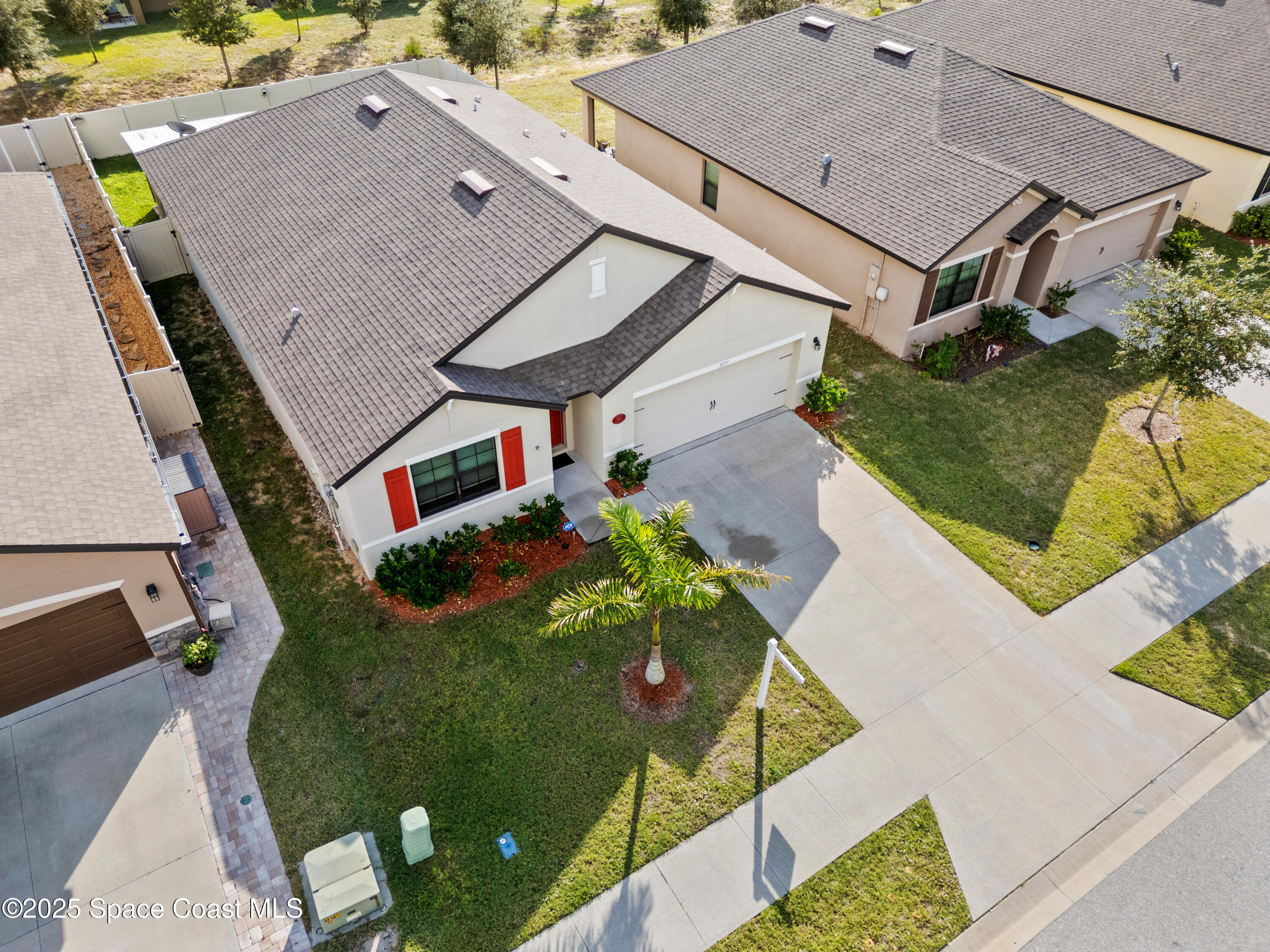 377 Snook Place Cocoa, FL 32927 - Photo 3 of 32 an aerial view of a house