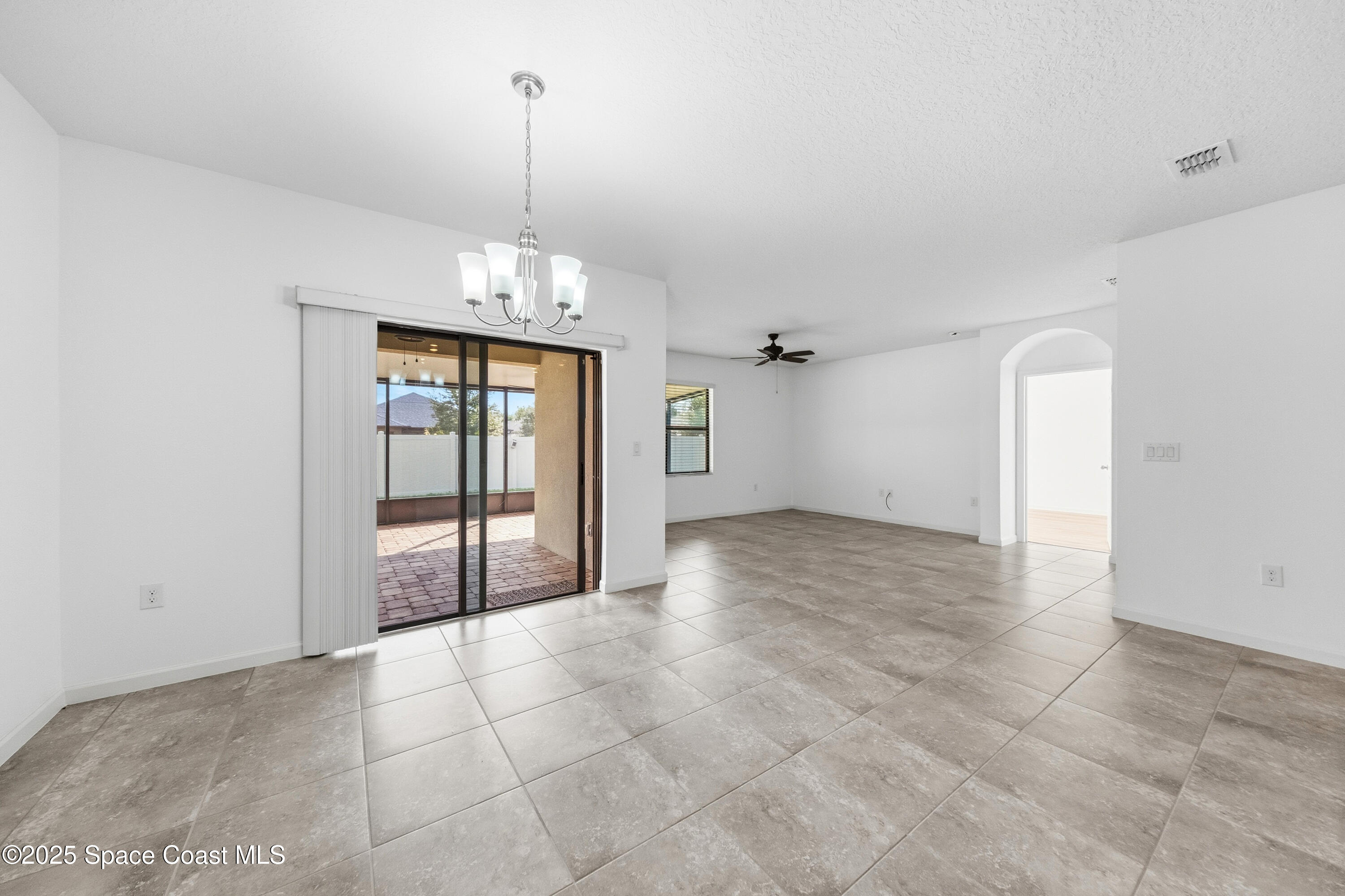 377 Snook Place Cocoa, FL 32927 - Photo 10 of 32 a view of a room with an empty space and a sink