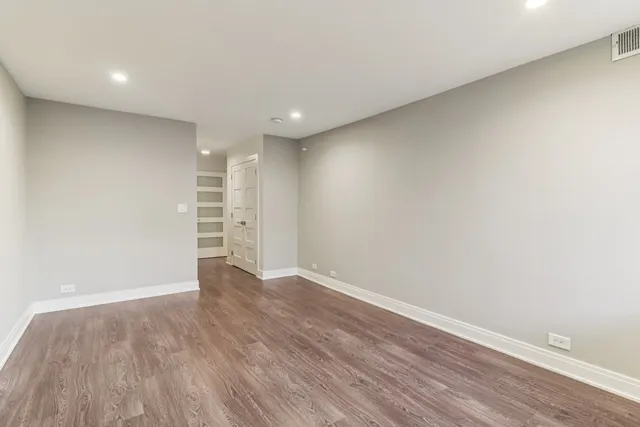 a view of an empty walk in closet