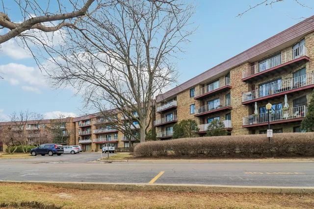 a kitchen with stainless steel appliances a sink stove and refrigerator
