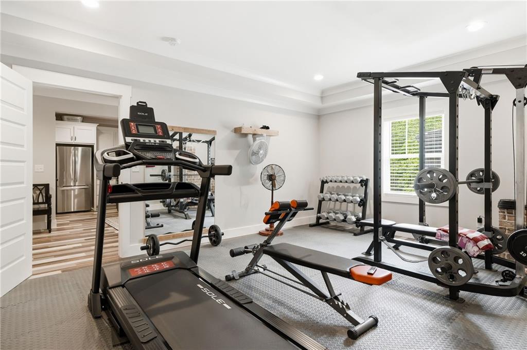 180 Laurel Ridge Lane Ball Ground, GA 30107 - Photo 51 of 71 a view of a room with gym equipment