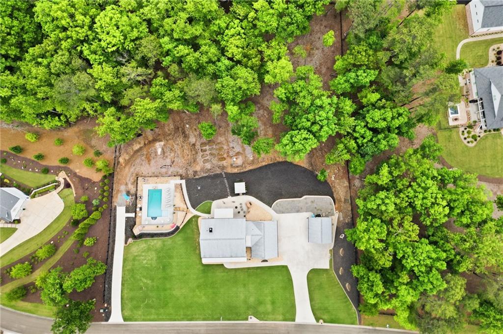 180 Laurel Ridge Lane Ball Ground, GA 30107 - Photo 69 of 71 a view of a house with a yard balcony and sitting area