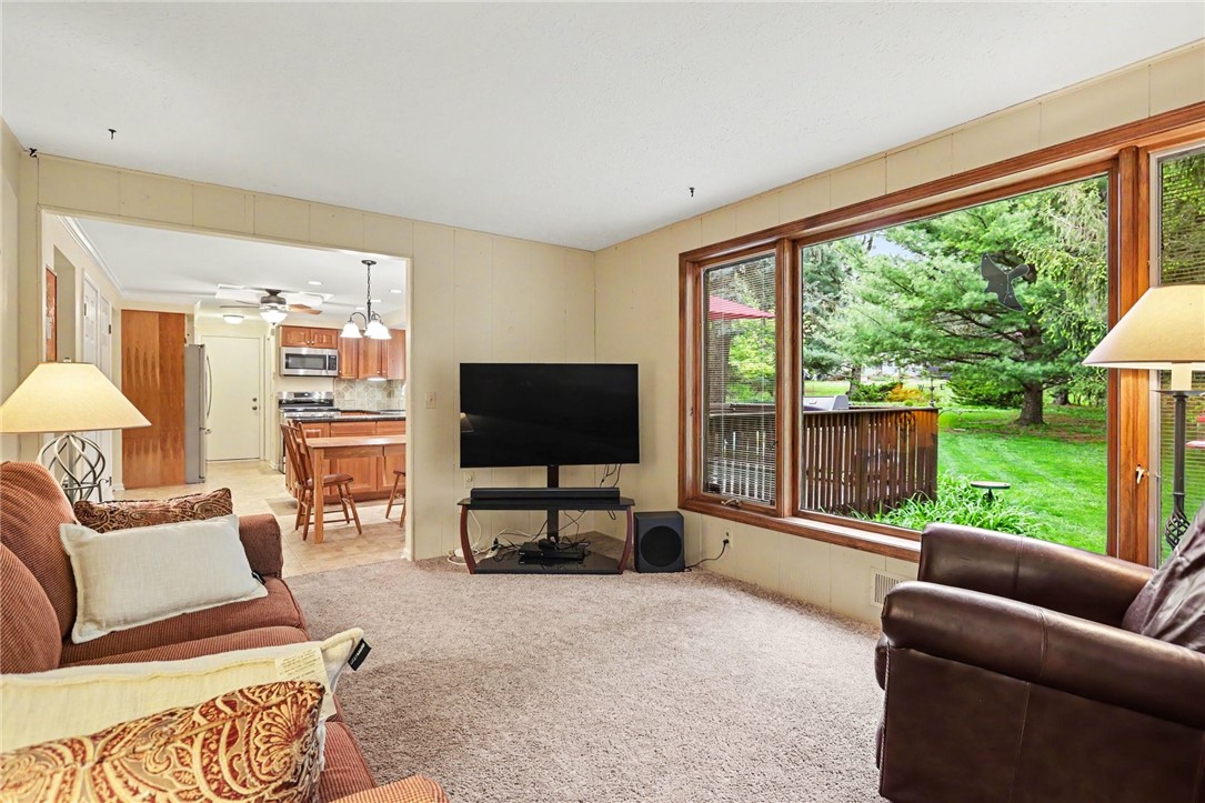 10 High Point Drive Parma, NY 14559 - Photo 7 of 28 Family room with large picture window overlooking