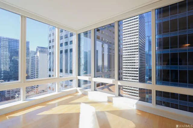 a view of a living room and bathroom