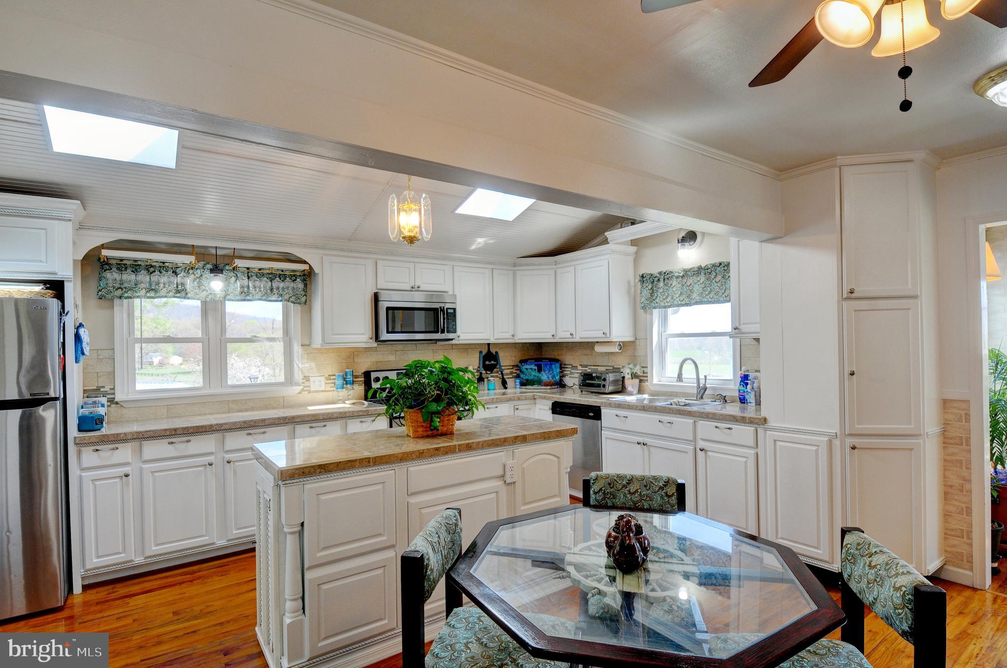 384 Perry Road Winchester, VA 22602 - Photo 12 of 61 a kitchen with sink and cabinets
