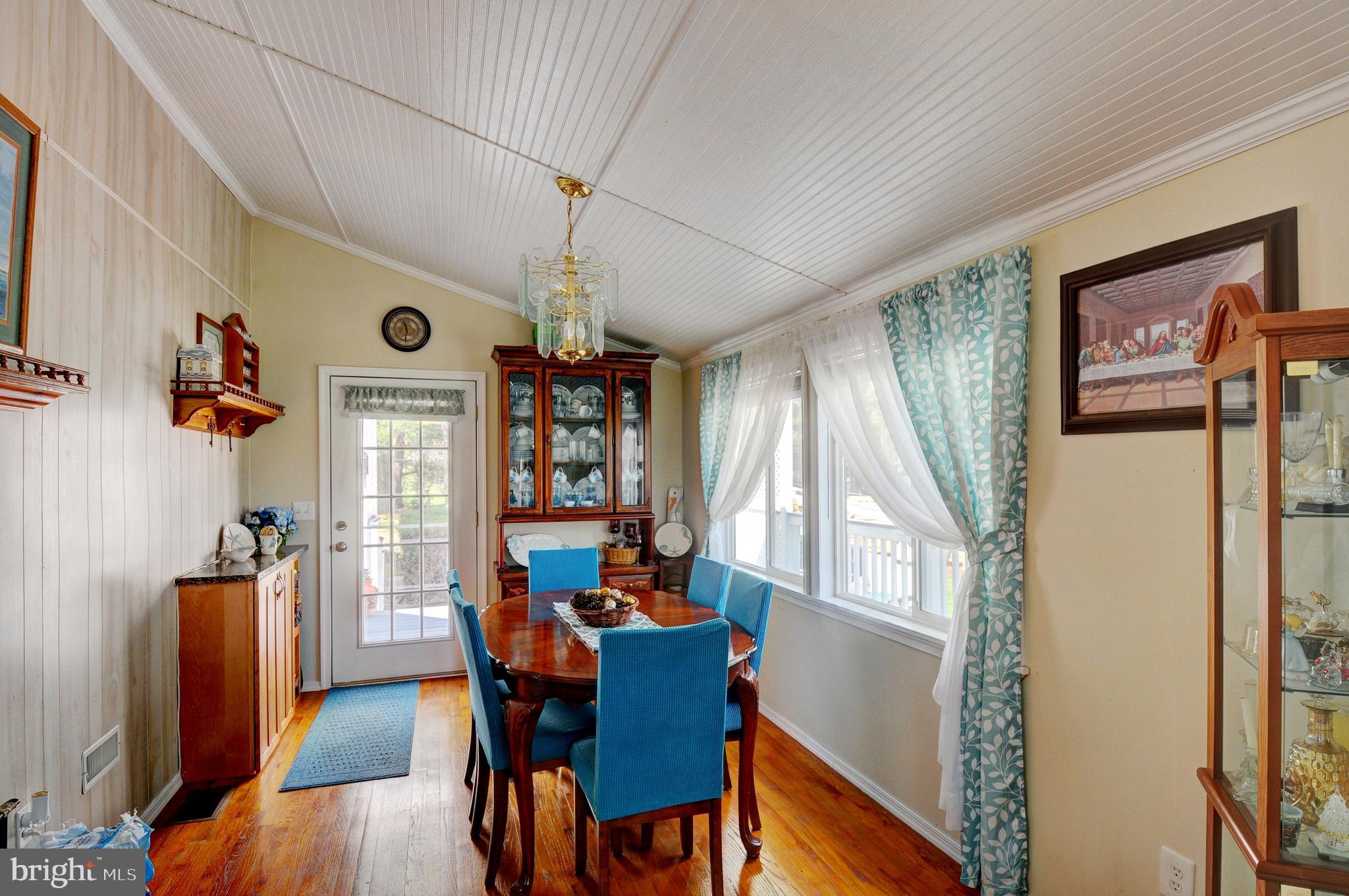 384 Perry Road Winchester, VA 22602 - Photo 17 of 61 a view of a dining room with furniture window and wooden floor