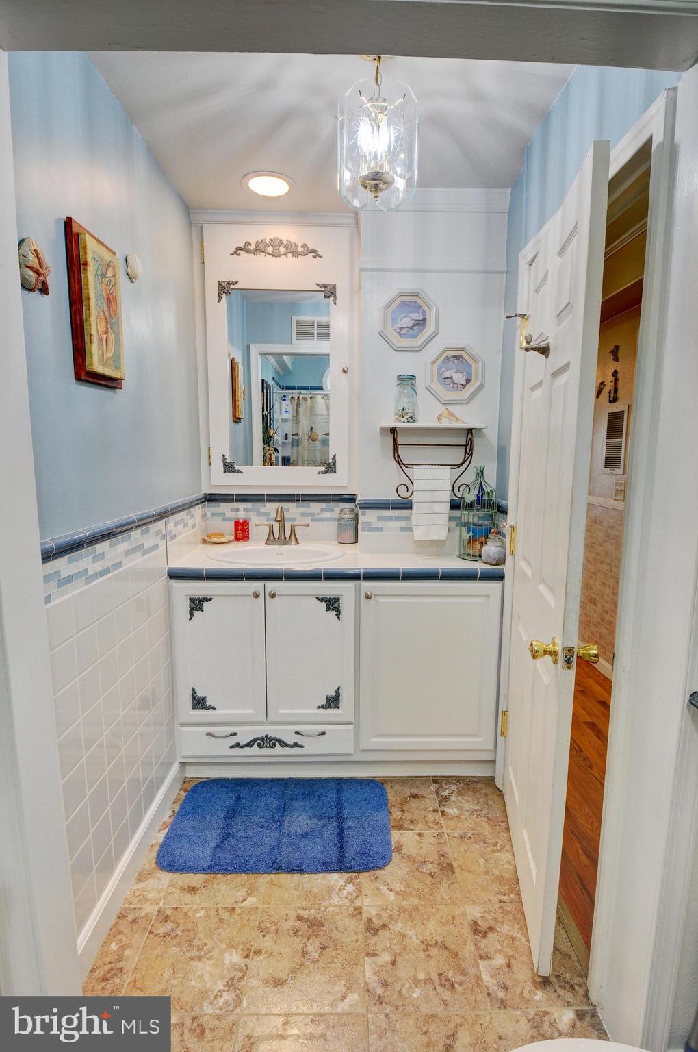 384 Perry Road Winchester, VA 22602 - Photo 21 of 61 a view of kitchen with granite countertop cabinets and window