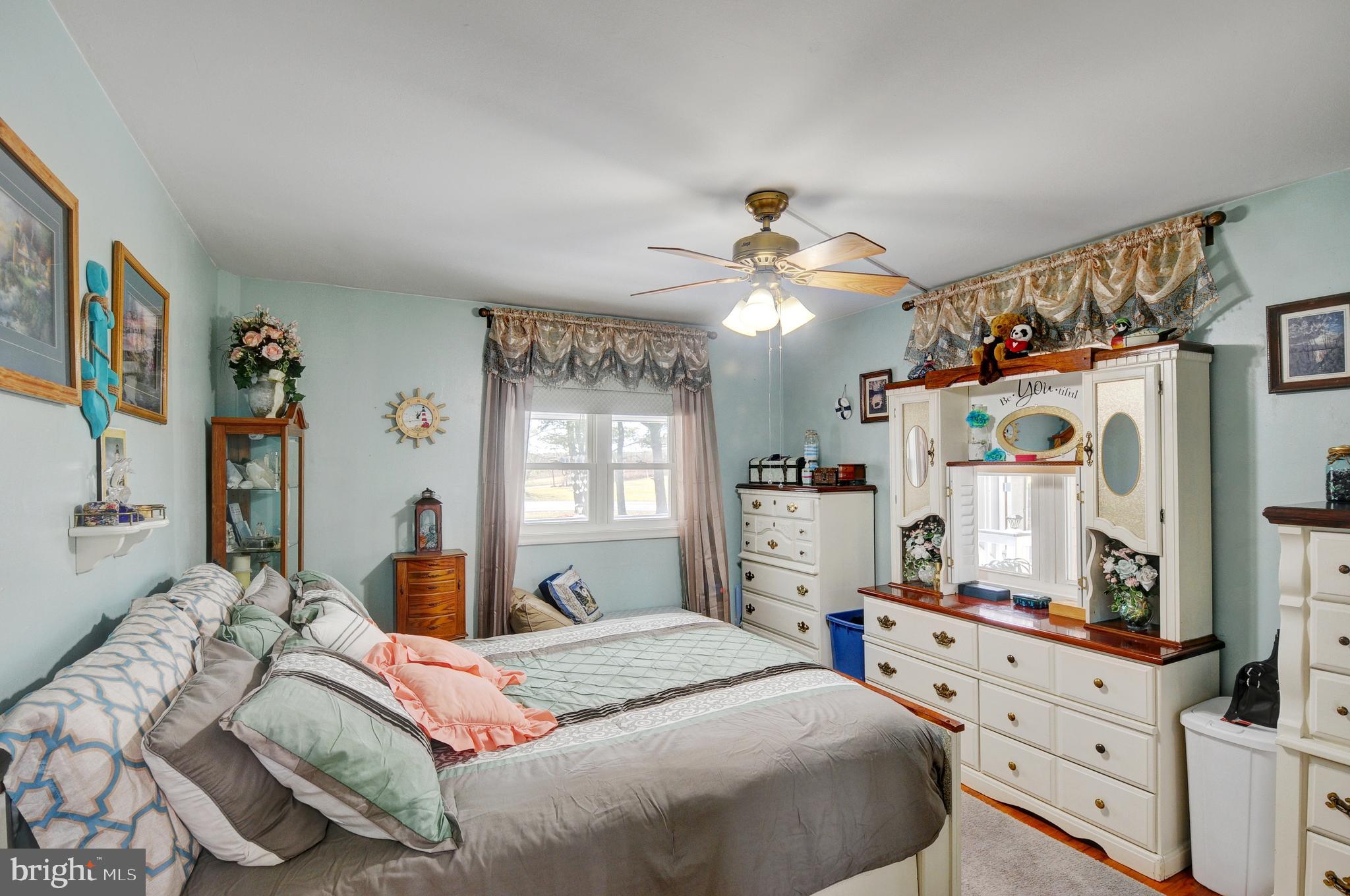 384 Perry Road Winchester, VA 22602 - Photo 22 of 61 a bedroom with a large bed and a window