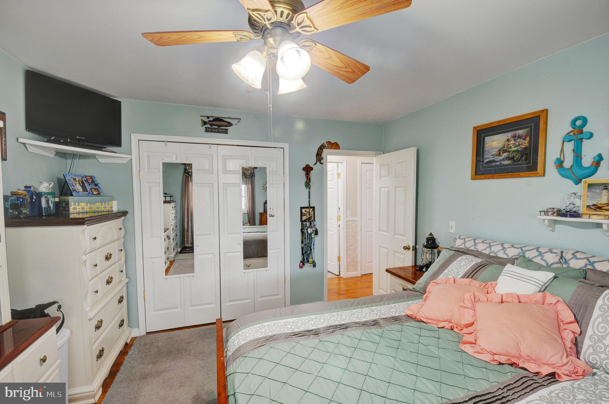 384 Perry Road Winchester, VA 22602 - Photo 23 of 61 a bedroom with furniture and a flat screen tv