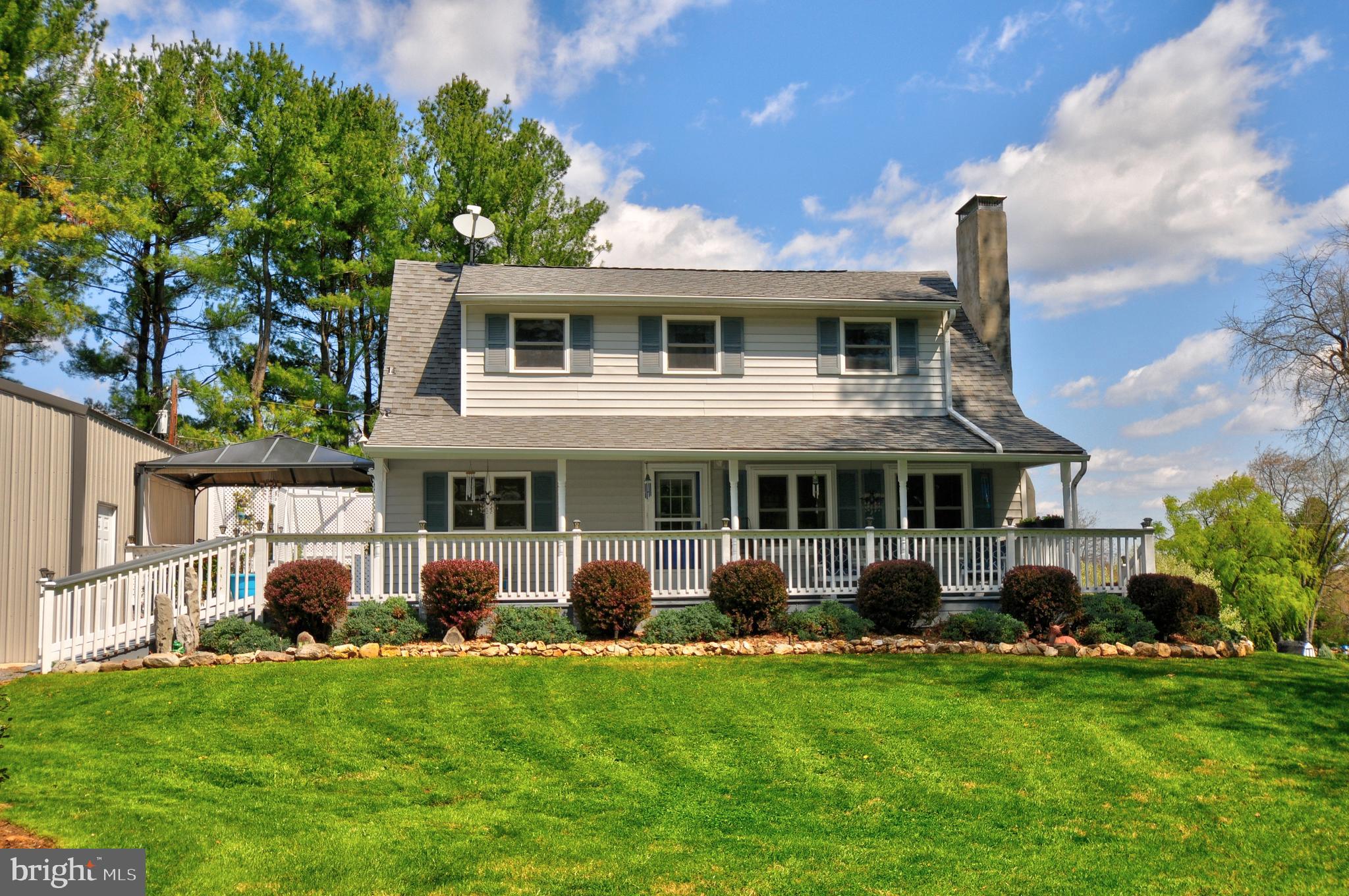 384 Perry Road Winchester, VA 22602 - Photo 46 of 61 a view of a house with backyard and garden