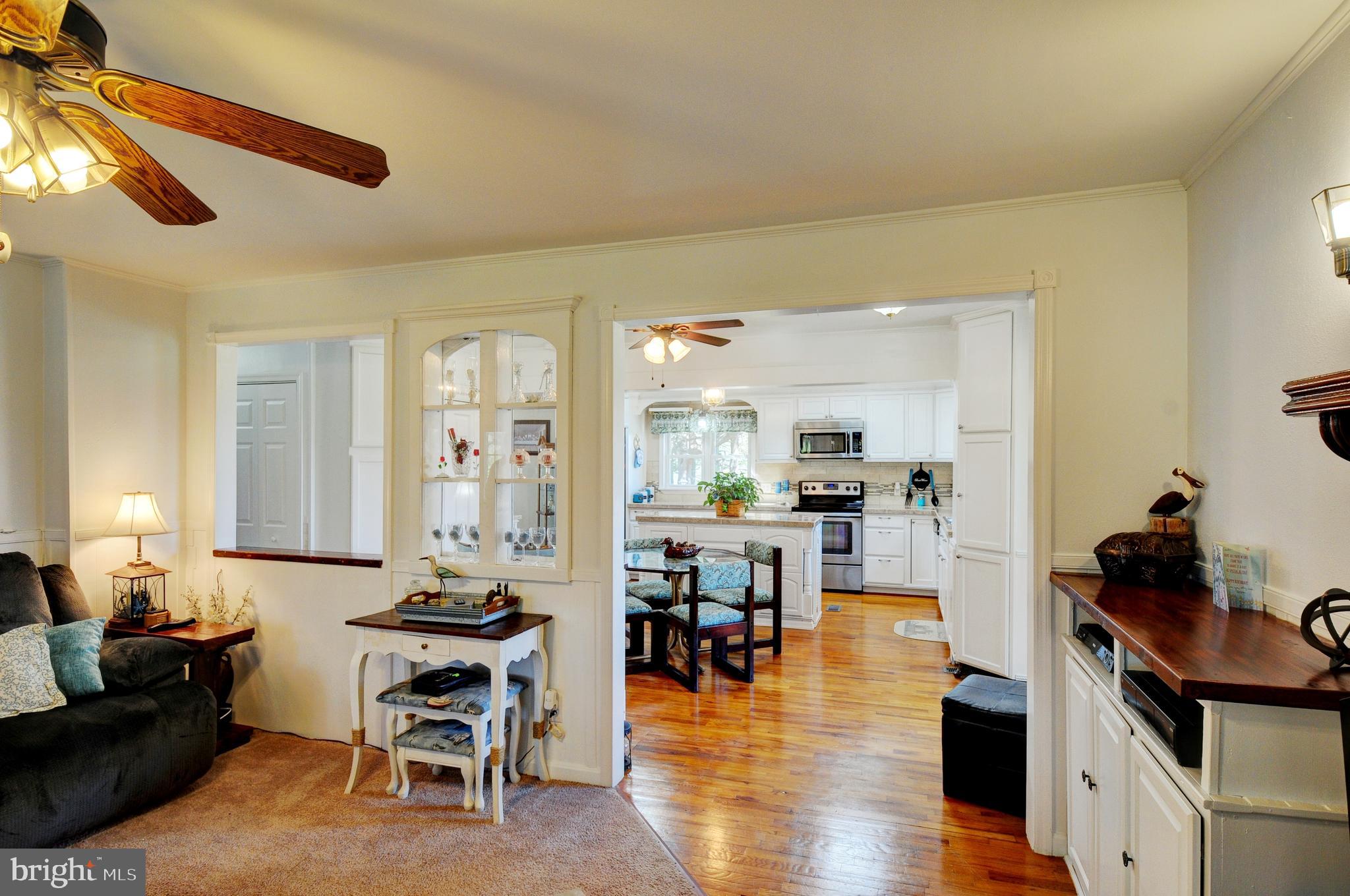 384 Perry Road Winchester, VA 22602 - Photo 8 of 61 a living room with furniture and wooden floor