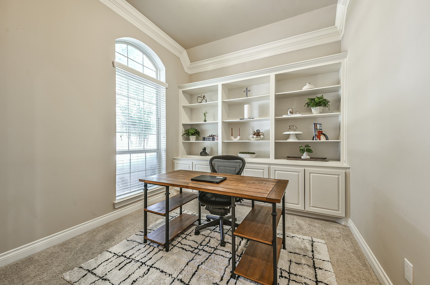10323 Belvamera Road Richmond, TX 77407 - Photo 12 of 25 The perfect home office to work from home with built-in shelving and added storage space.