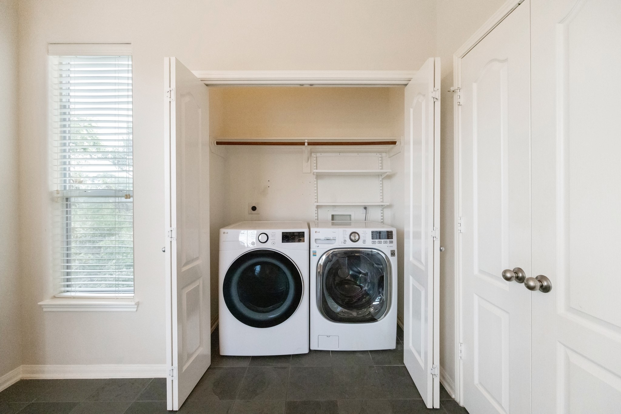 1839 Stacy Crest Houston, TX 77008 - Photo 23 of 39 a utility room with dryer and washer