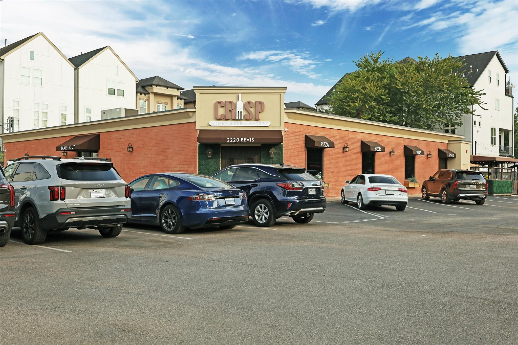 1839 Stacy Crest Houston, TX 77008 - Photo 34 of 39 a view of a cars park in front of house