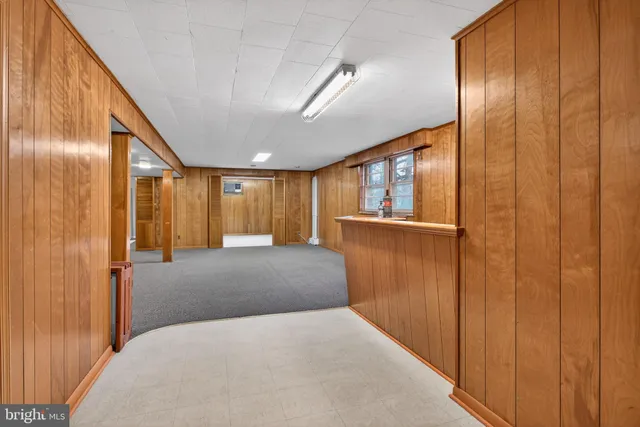 a view of a hallway with closet area