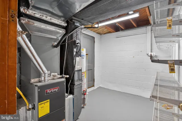 a view of a chairs and table in the backyard