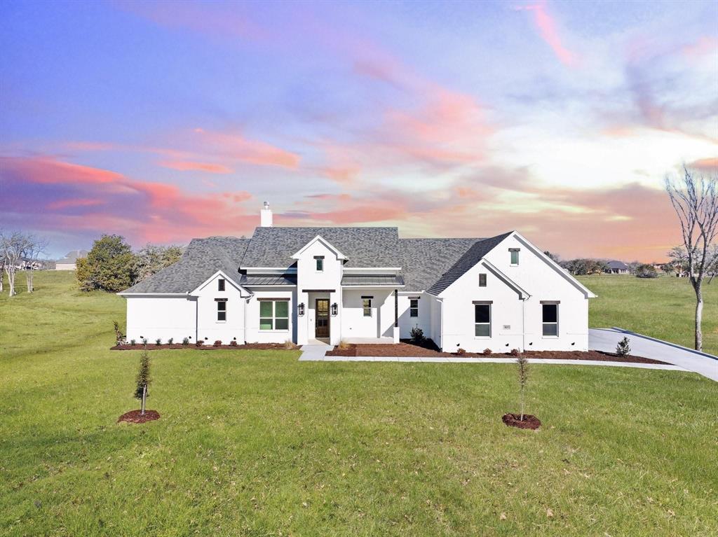 815 Wind River Pass Azle, TX 76020 - Photo 1 of 1 a view of a house with a big yard